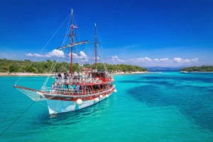 Junior Excursions historic wooden sailing ship on Blue Lagoon day cruise from Split Croatia with crystal clear turquoise waters gallery image 1